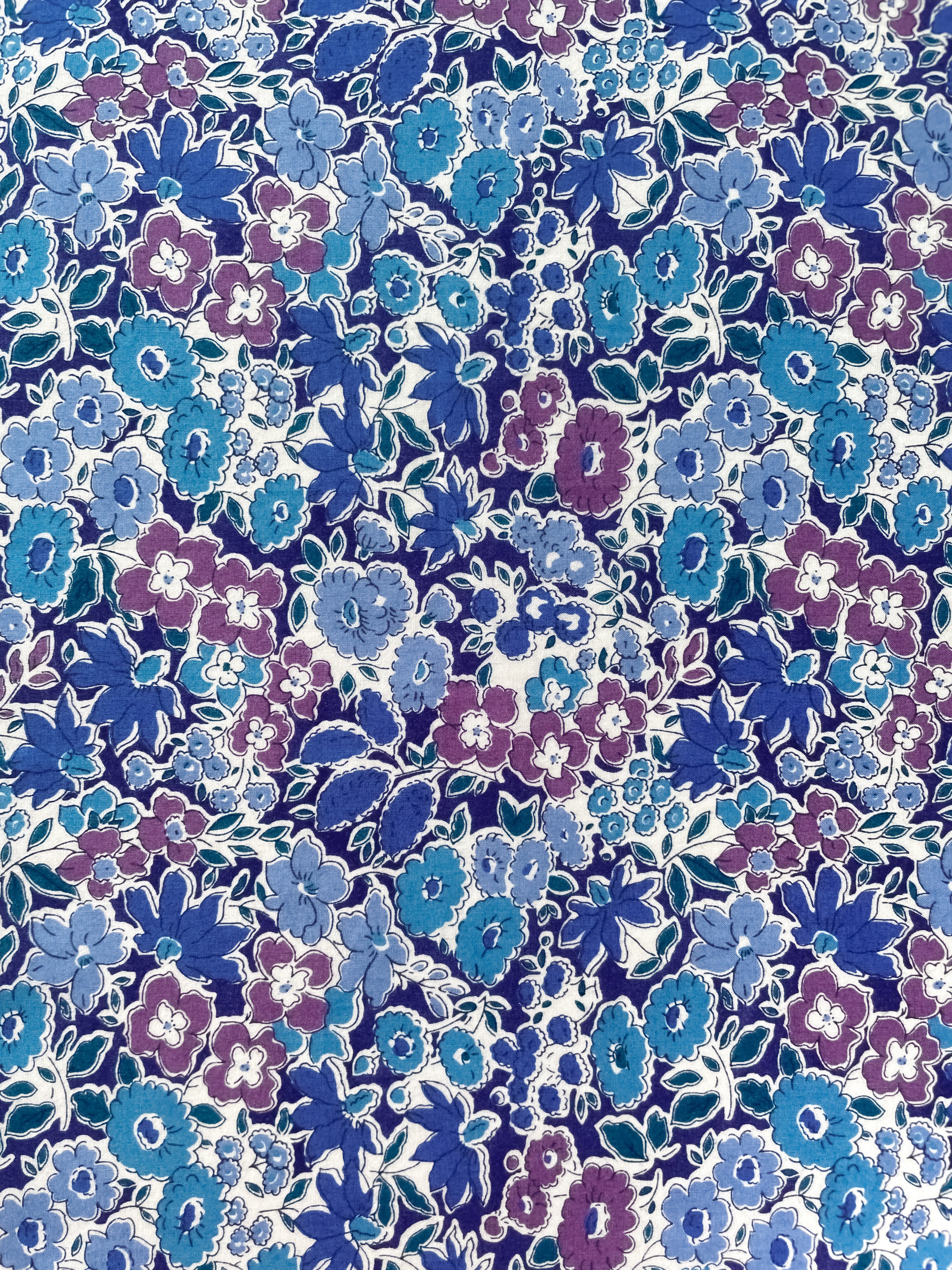 This vintage Liberty of London Cornflower vintage floral print is simply sublime, featuring a suite of moody blue hues, accented with deep teal and purple.