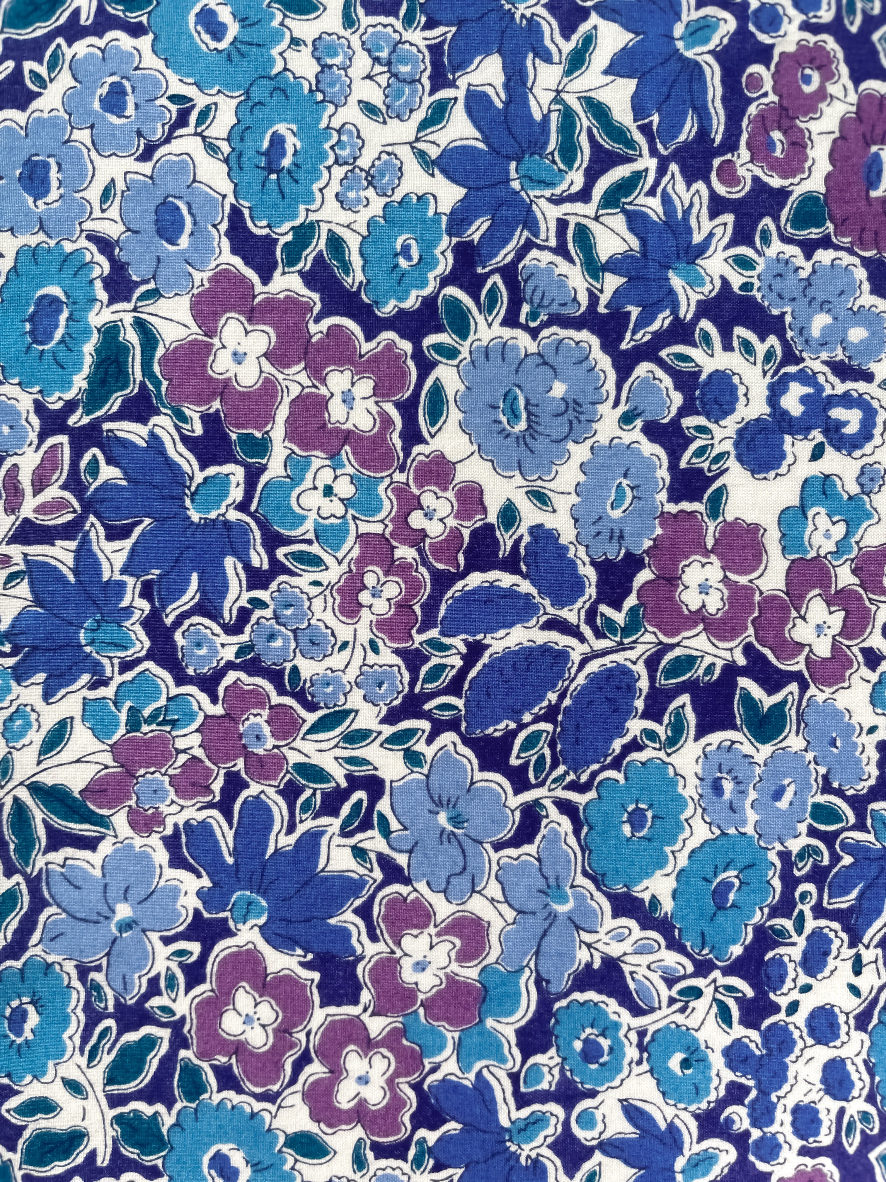This vintage Liberty of London Cornflower vintage floral print is simply sublime, featuring a suite of moody blue hues, accented with deep teal and purple.