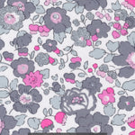 A rare discontinued Betsy from the highly sought-after Jewel Box collection. Betsy Platinum features soft grey and hot pink flowers with silver glitter accents.