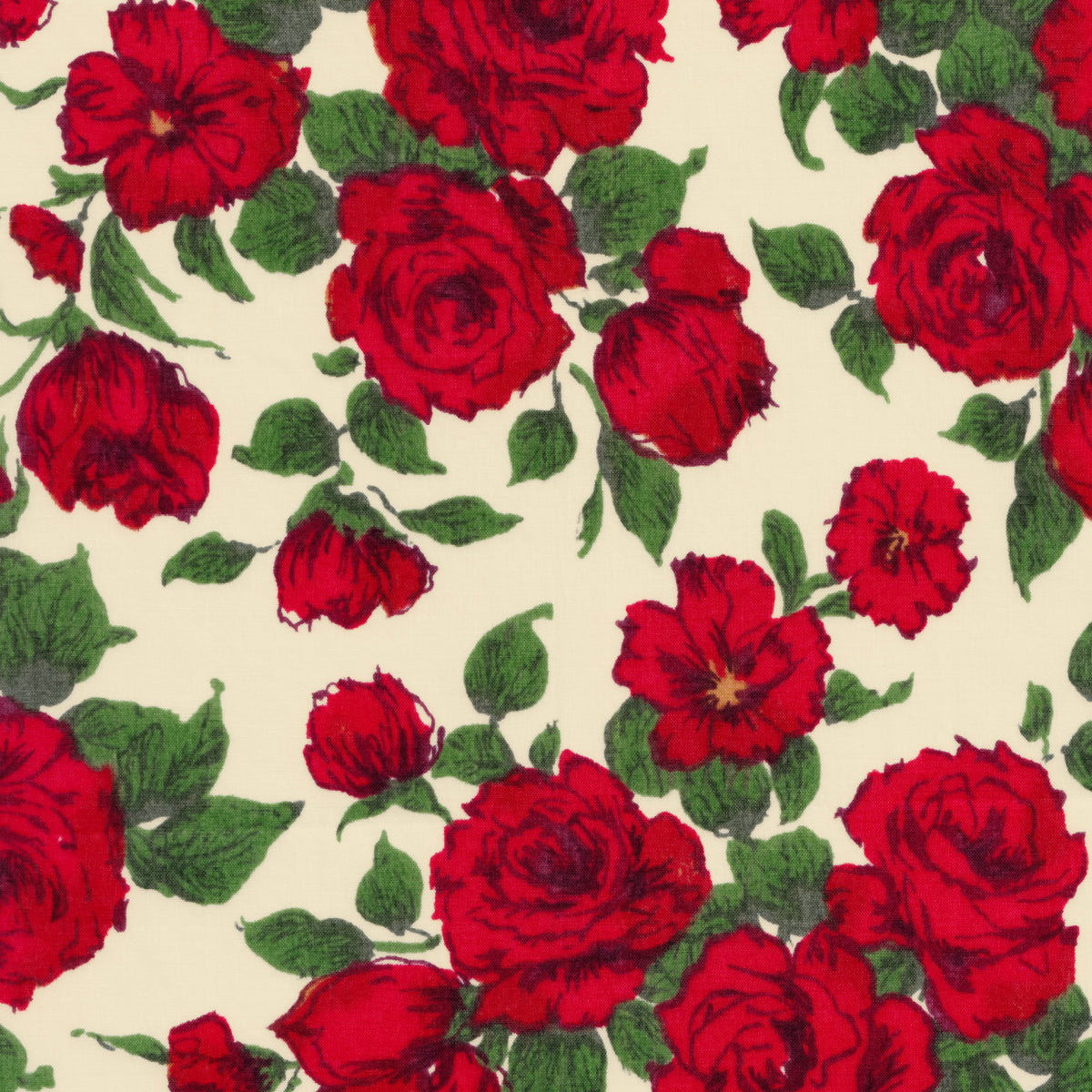 A romantic and timeless Liberty rose print fabric from the 1990s. Carline has richly detailed deep red roses with dark green leaves scattered across a cream background.