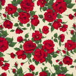 A romantic and timeless Liberty rose print fabric from the 1990s. Carline has richly detailed deep red roses with dark green leaves scattered across a cream background.