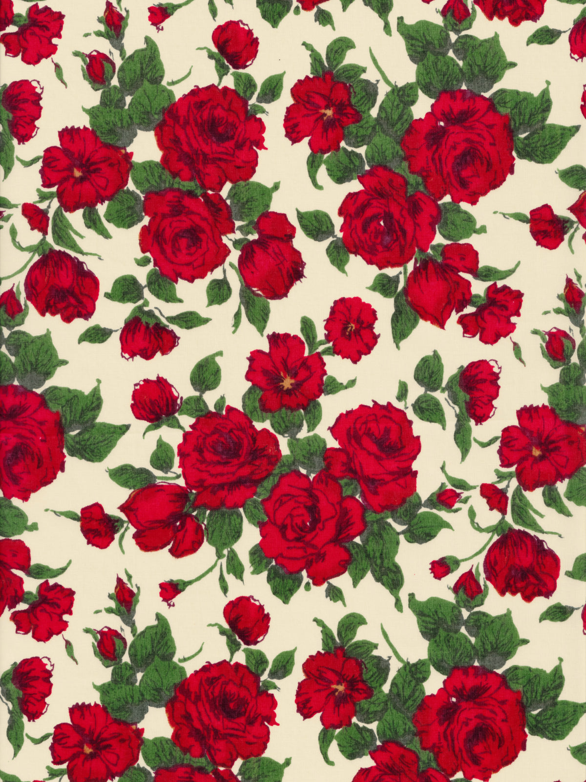 A romantic and timeless Liberty rose print fabric from the 1990s. Carline has richly detailed deep red roses with dark green leaves scattered across a cream background.