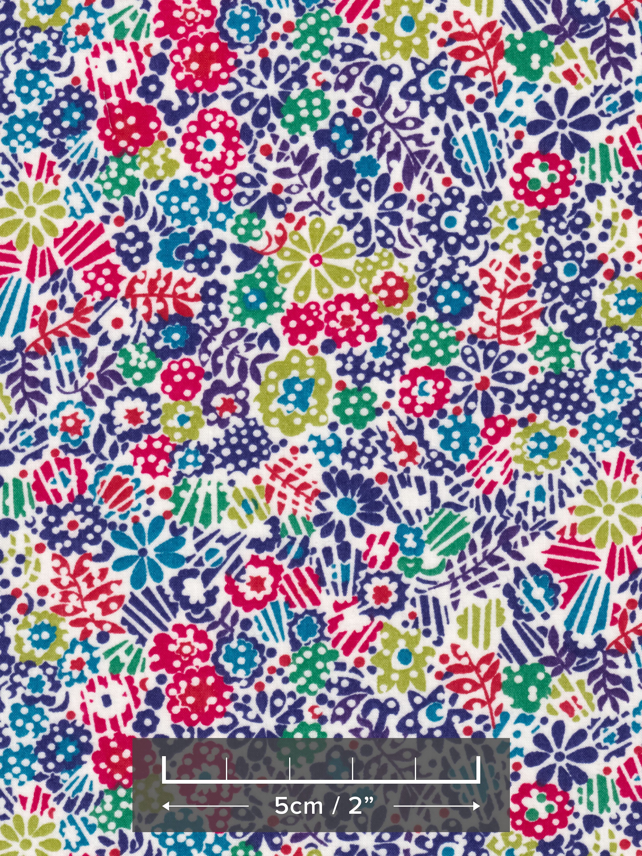 Clarricoates, from Liberty's 2012 seasonal collection, has a bold all-over mix of graphic floral motifs in navy, red, and chartreuse green.
