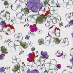 Glynis is a rare graphic Liberty floral from the early 2000s, with hand-drawn flowers in purple, red, fuchsia, and sage green on a white background.