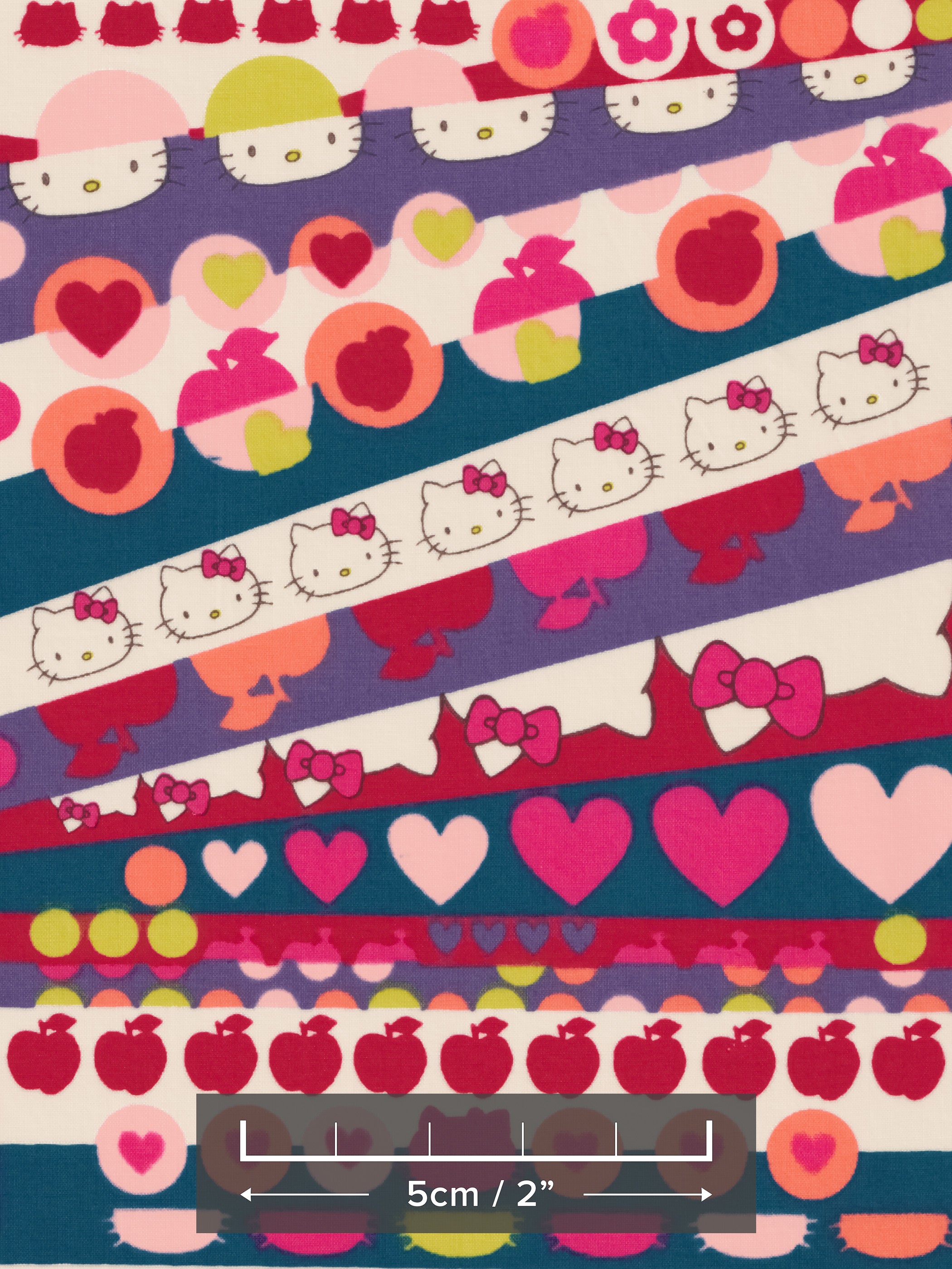 A geometric print from one of Liberty Japan's earliest collaborations with Hello Kitty, this vibrant print would be perfect for a little girl's garment.