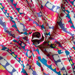 A geometric print from one of Liberty Japan's earliest collaborations with Hello Kitty, this vibrant print would be perfect for a little girl's garment.