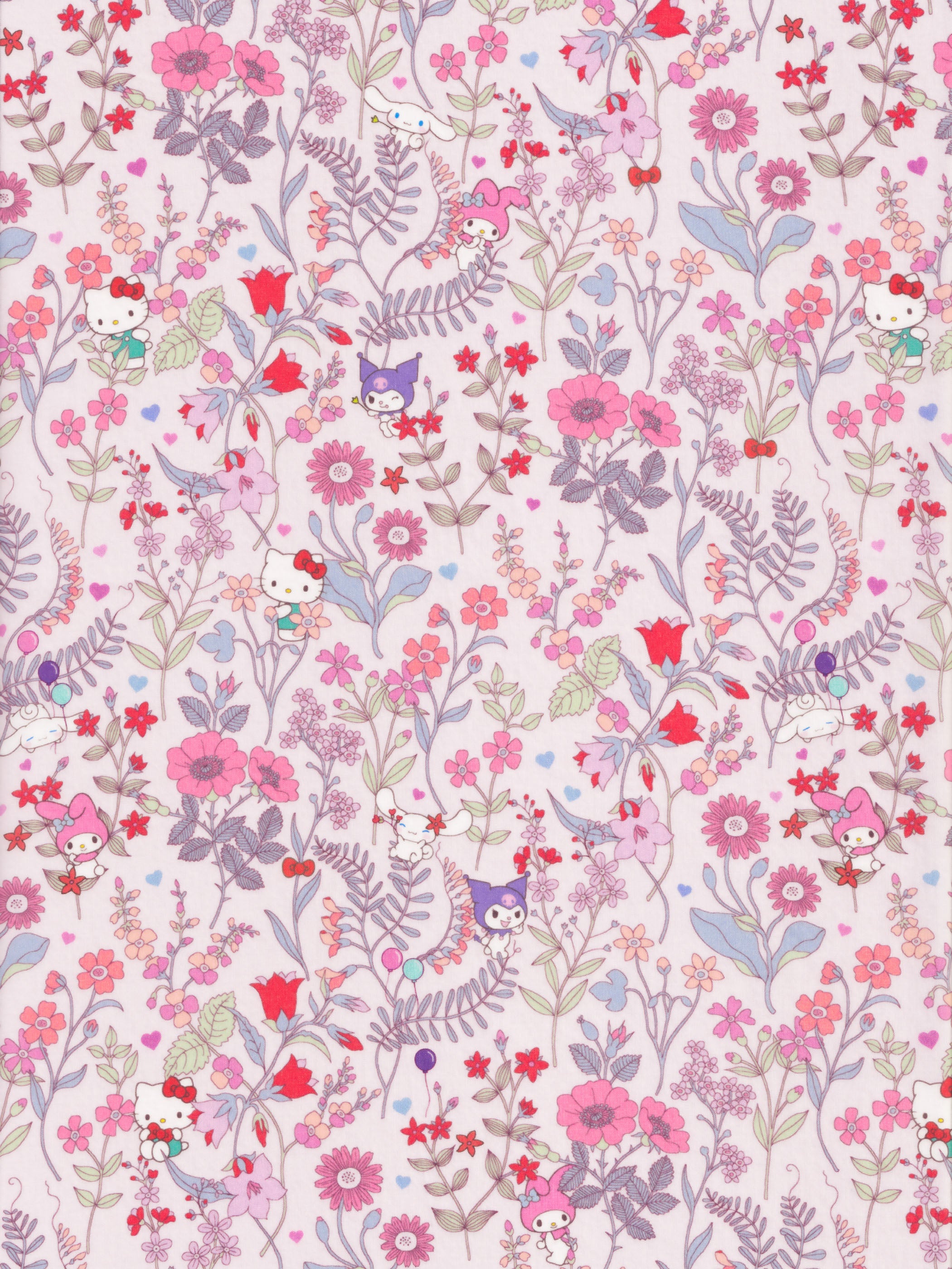 A seriously gorgeous print from the newest Liberty Japan x Sanrio collaboration. Hello Kitty, Kuromi and friends dance on a soft, dreamy version of the Lola Weisselberg print, with pink and red wildflowers, lilac ferns and scattered hearts on a blush pink background.