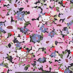 This print from the newest Liberty Japan x Hello Kitty collaboration is a twist on the much-loved classic Liberty print Thorpe. Hello Kitty and her teddy play hide-and-seek in a meadow of flowers in pinks and purples.