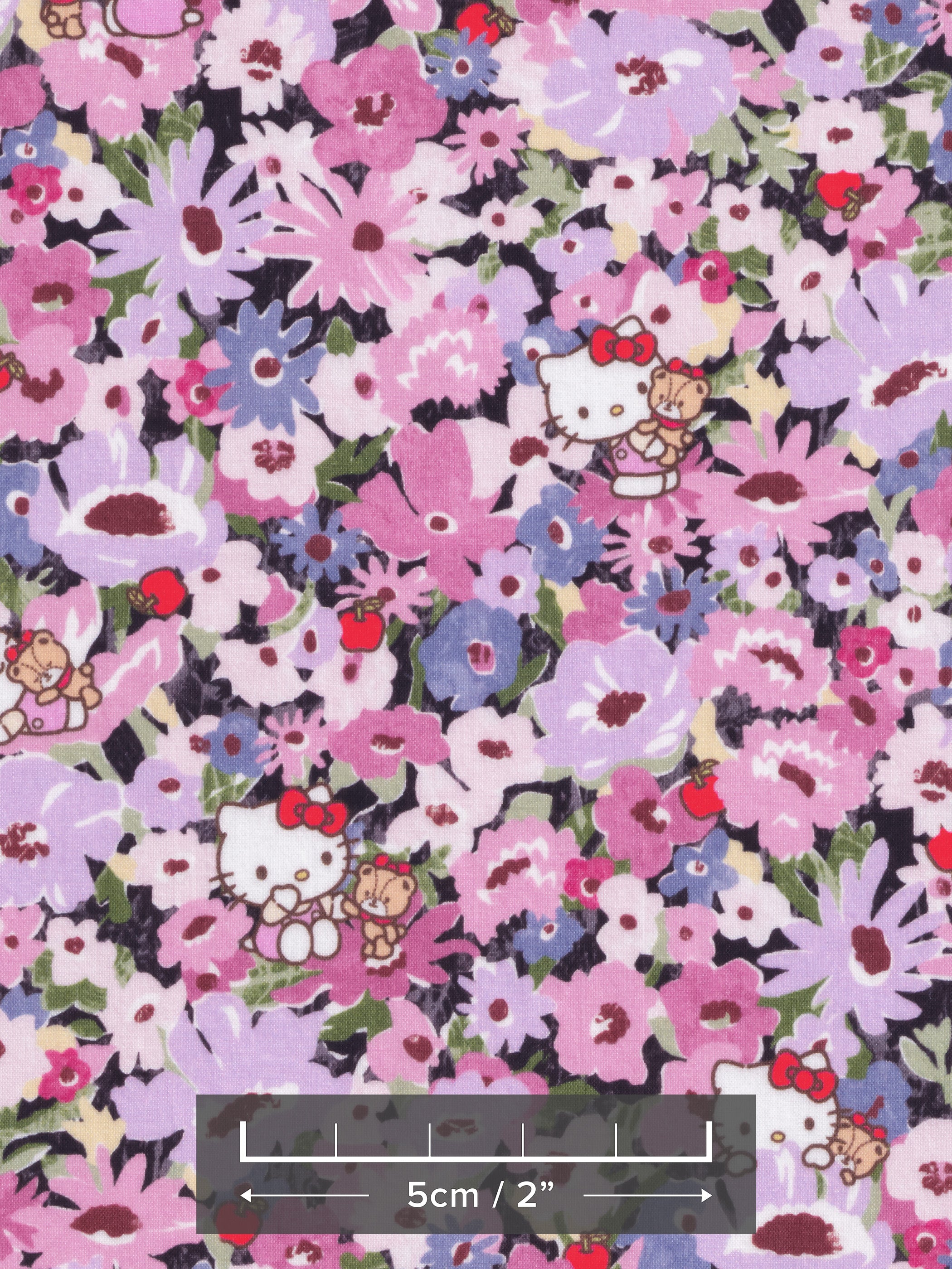 This print from the newest Liberty Japan x Hello Kitty collaboration is a twist on the much-loved classic Liberty print Thorpe. Hello Kitty and her teddy play hide-and-seek in a meadow of flowers in pinks and purples.