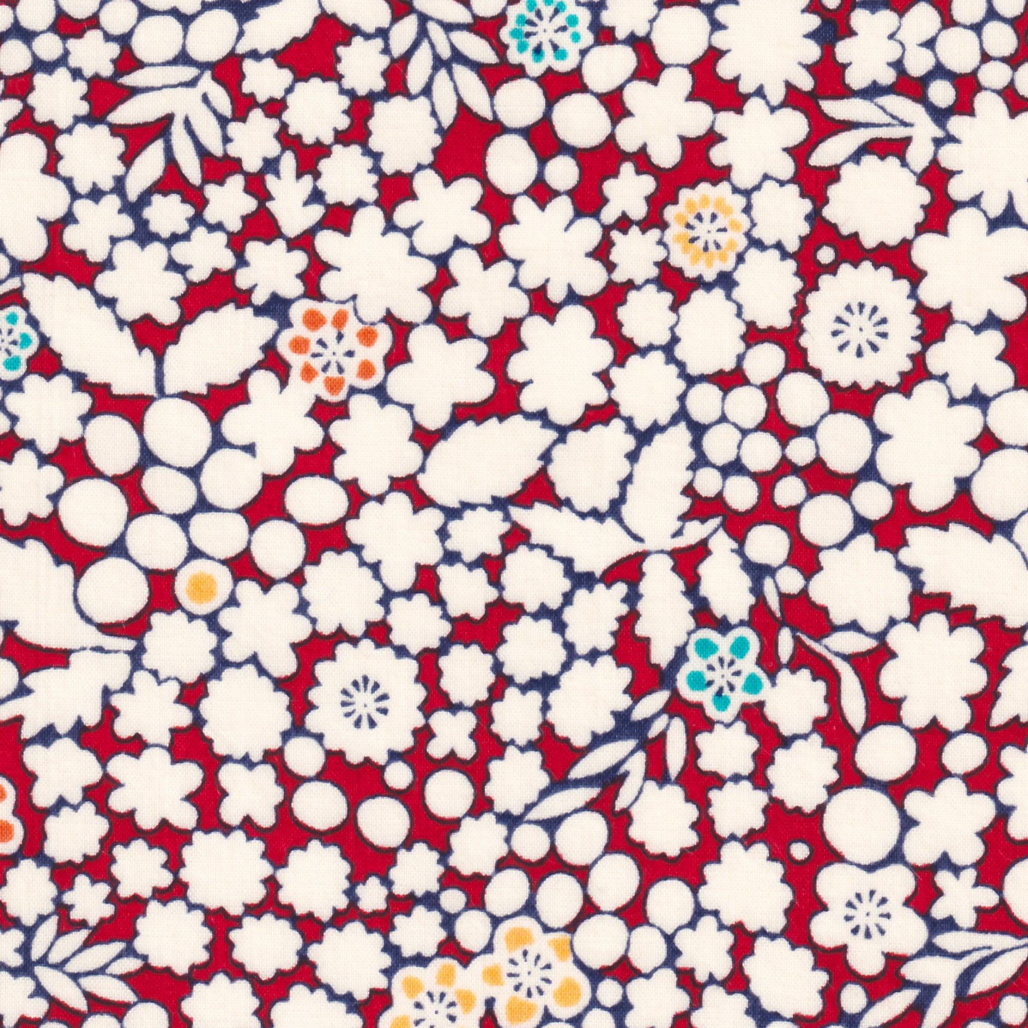 A delightful but rare print, Kathy is a cherry red and warm white floral with little pops of aqua and yellow.