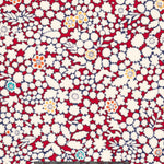 A delightful but rare print, Kathy is a cherry red and warm white floral with little pops of aqua and yellow.