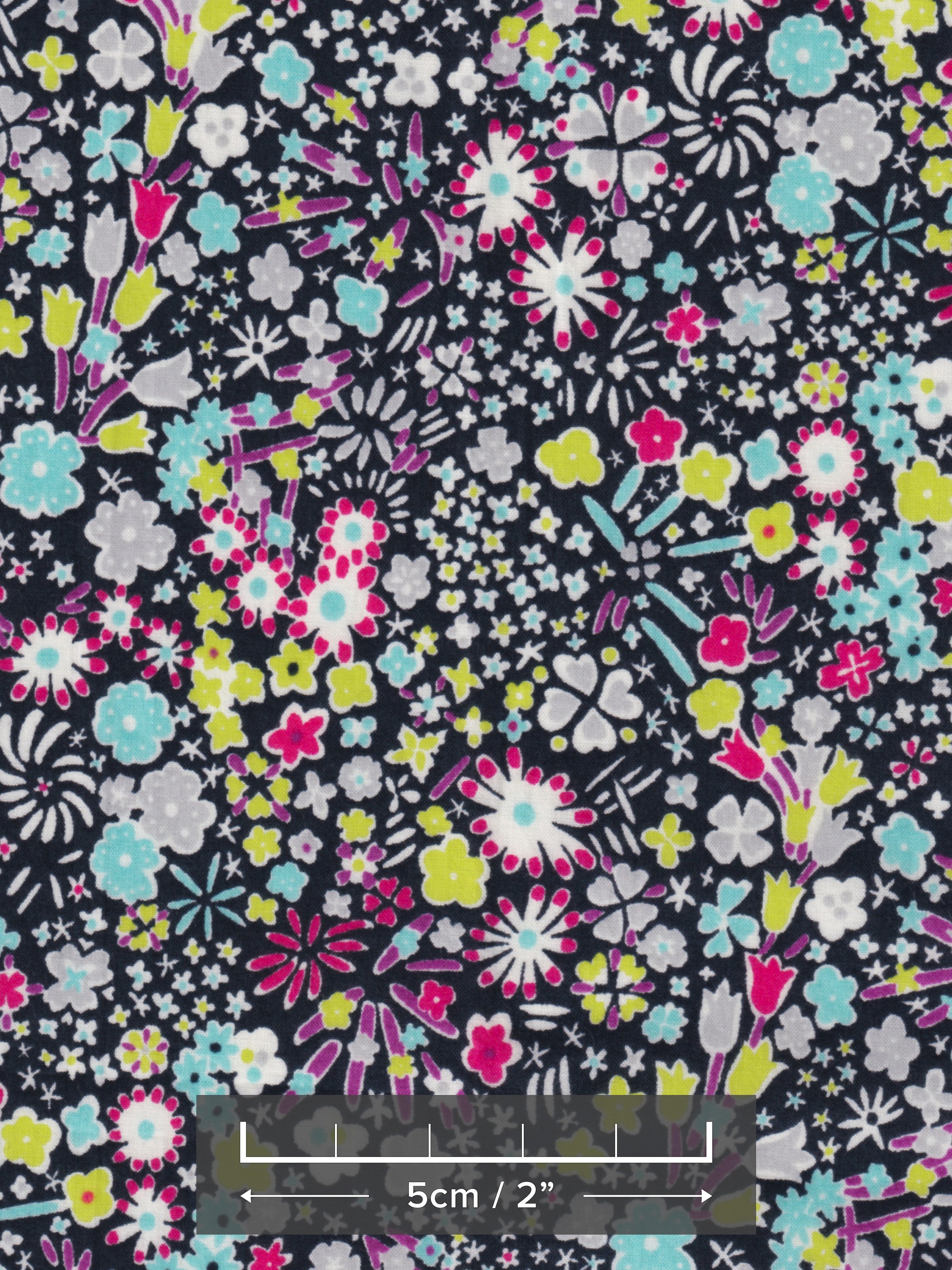 Kayoko is a dense floral pattern inspired by a design in a 1920s pattern book in the Liberty Fabrics archive. This discontinued colourway has pops of blue, acid green, pink, and purple on a black background.