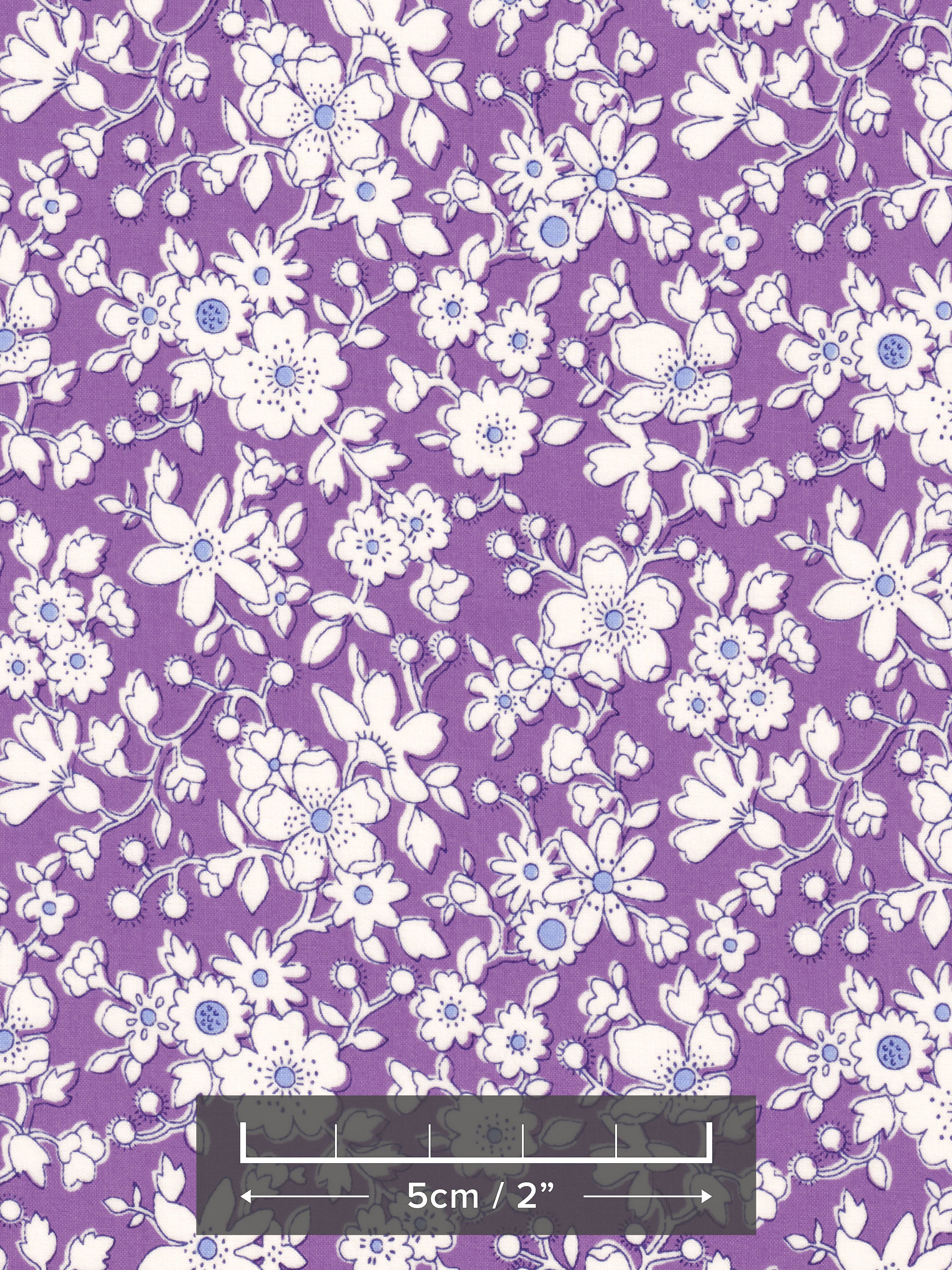 This Maddsie colourway from Liberty Japan's 2009 collection has pretty hand-drawn white flowers on violet purple background.