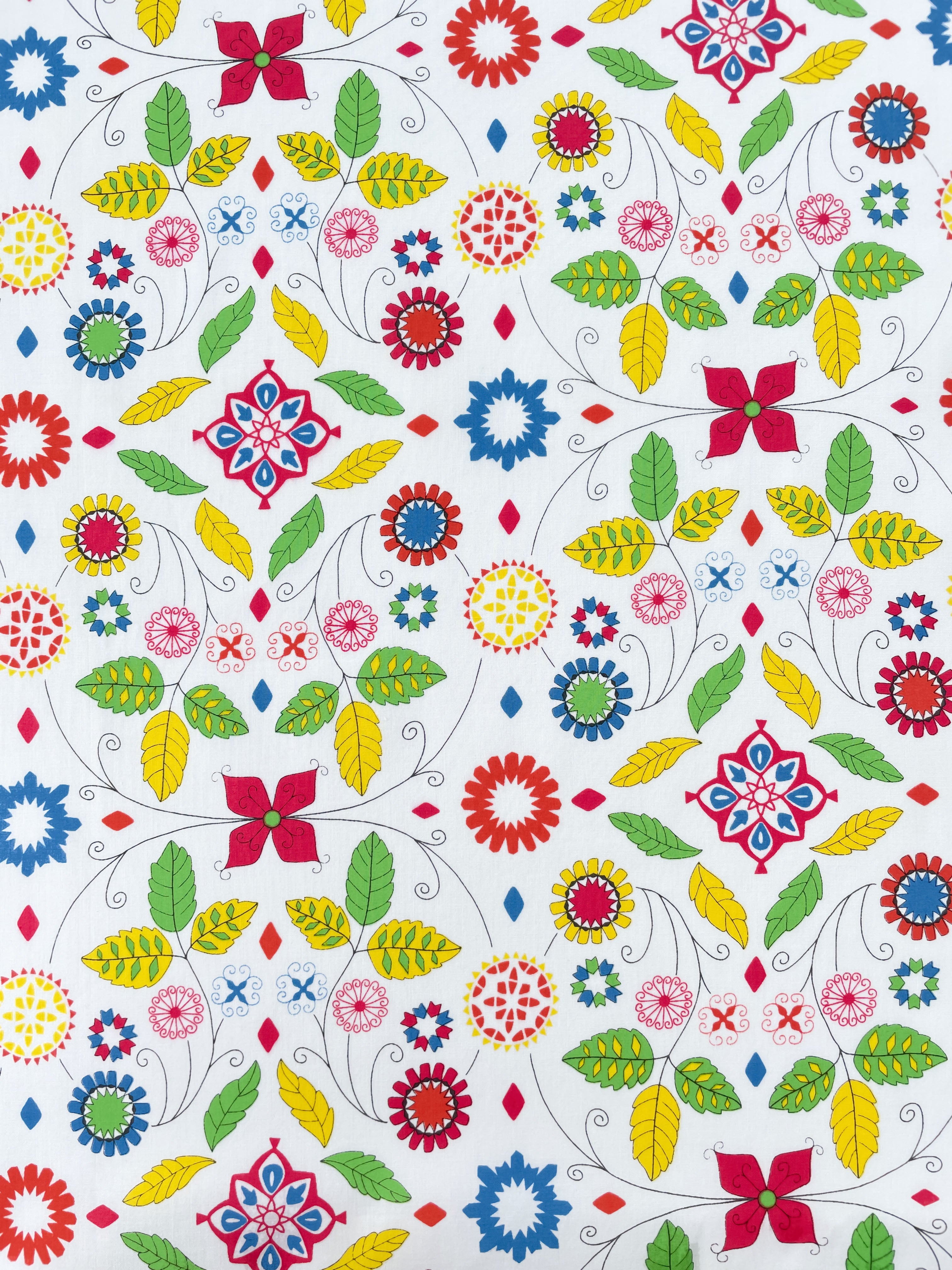 Minty is a rare Liberty print, and this colourway is from the early 2000s. Whimsical florals in sunlit colours give it an airy and cheerful charm.