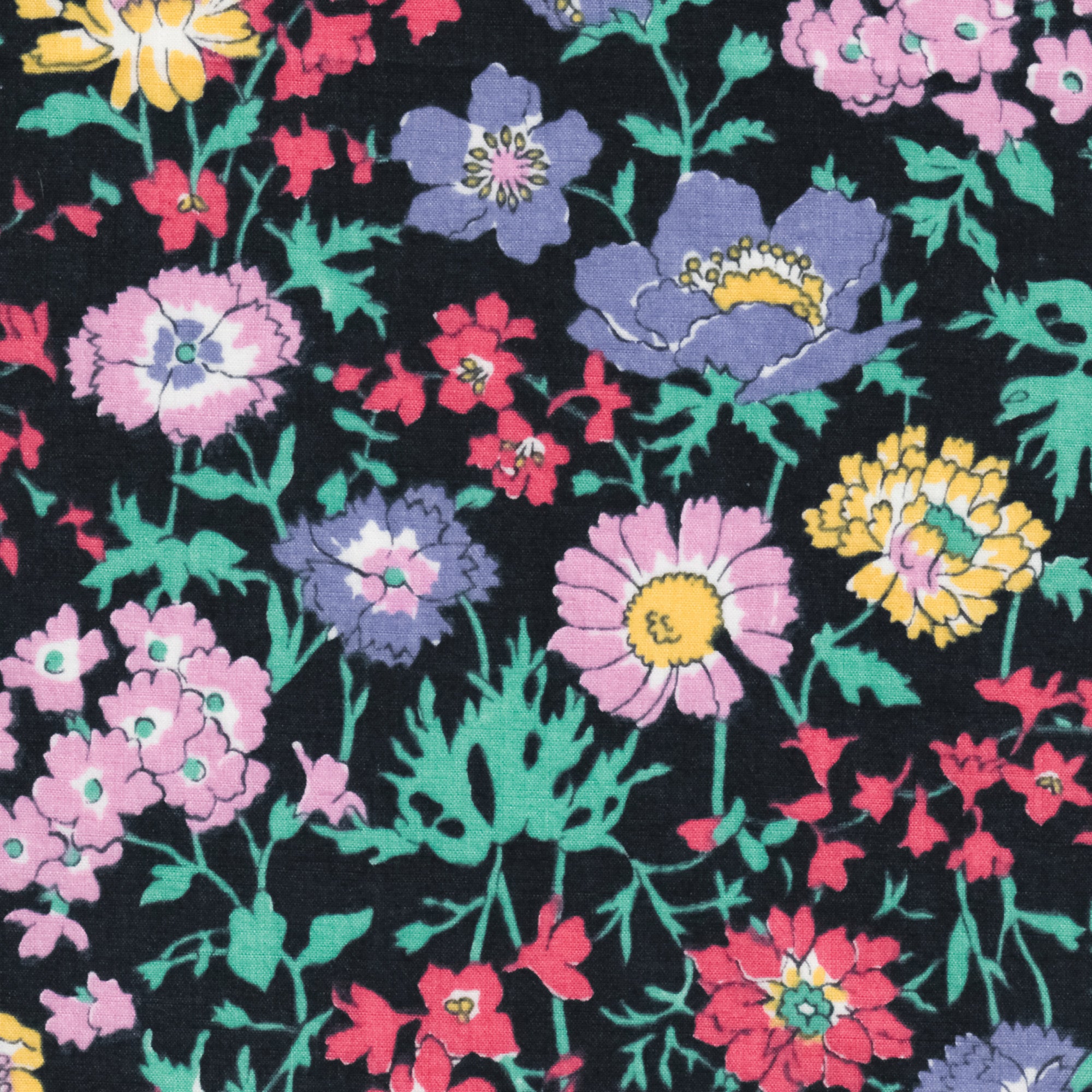 Channel the electric colours of the 1980s with this original Liberty Pyretheum Daisy print. Red, purple, blue, green, and yellow flowers pop against a blackground. 