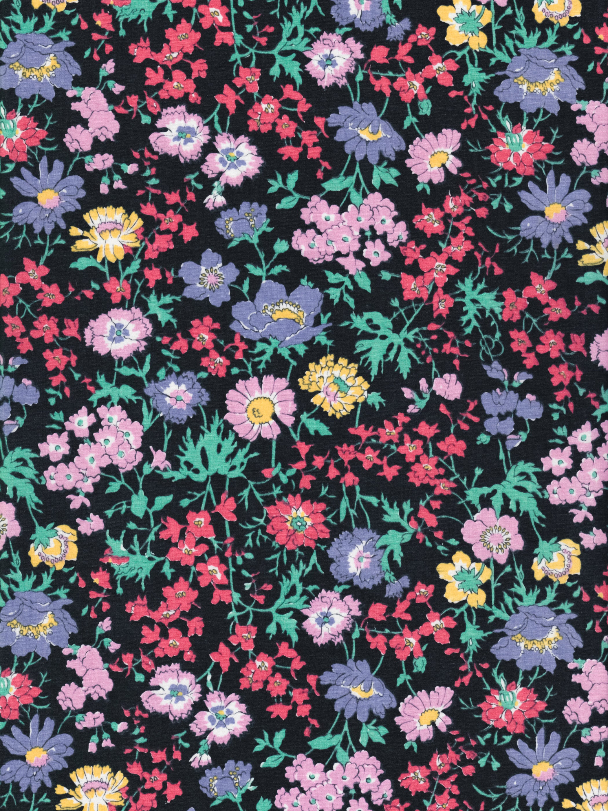 Channel the electric colours of the 1980s with this original Liberty Pyretheum Daisy print. Red, purple, blue, green, and yellow flowers pop against a blackground. 
