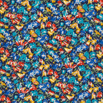 An old unnamed Liberty floral print with rich blue, red, and mustard yellow flowers on a navy background. A lovely rare fabric for Liberty collectors!