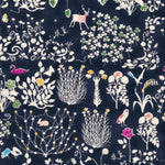 Yoshie is a novelty Liberty Japan print with cute woodland critters like stags, owls, and bunny rabbits. This print has metallic gold accents which are striking against the mottled navy background.